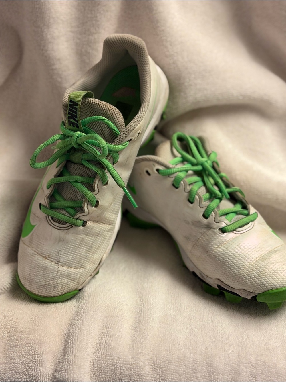 Nike White Football Cleats with Green Insole Accents